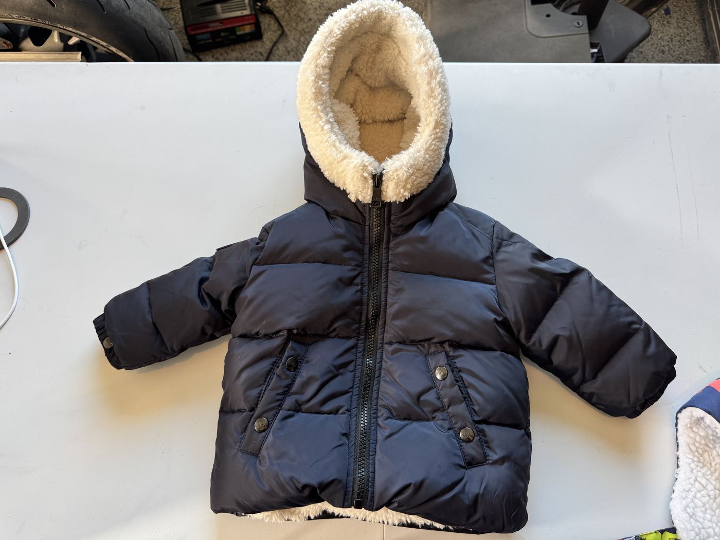 SAM. New York baby puffer jacket with sherpa-lined hood