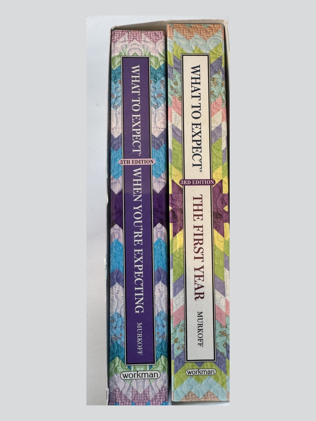What to Expect two-book gift set: the two books standing in their slipcase, spines out — When You're Expecting, 5th edition, and The First Year, 3rd edition